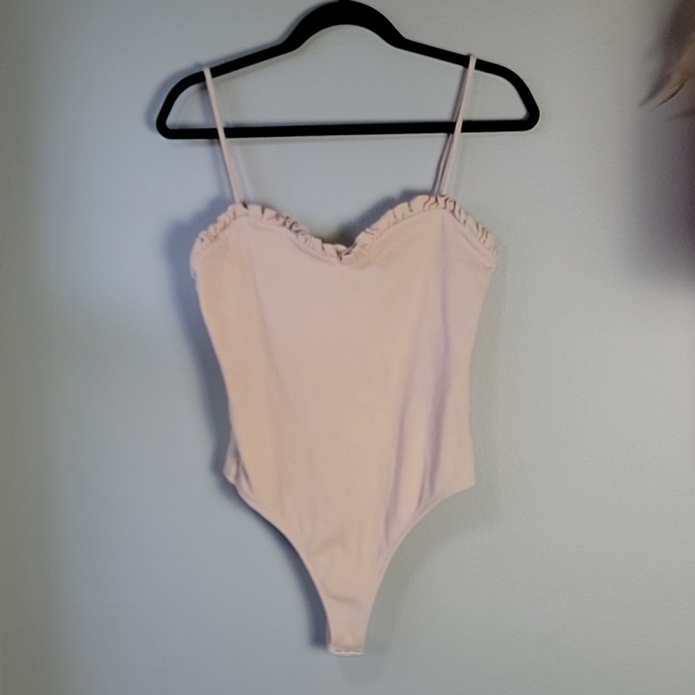 Privacy please ribbed cream ruffle trim bodysuit